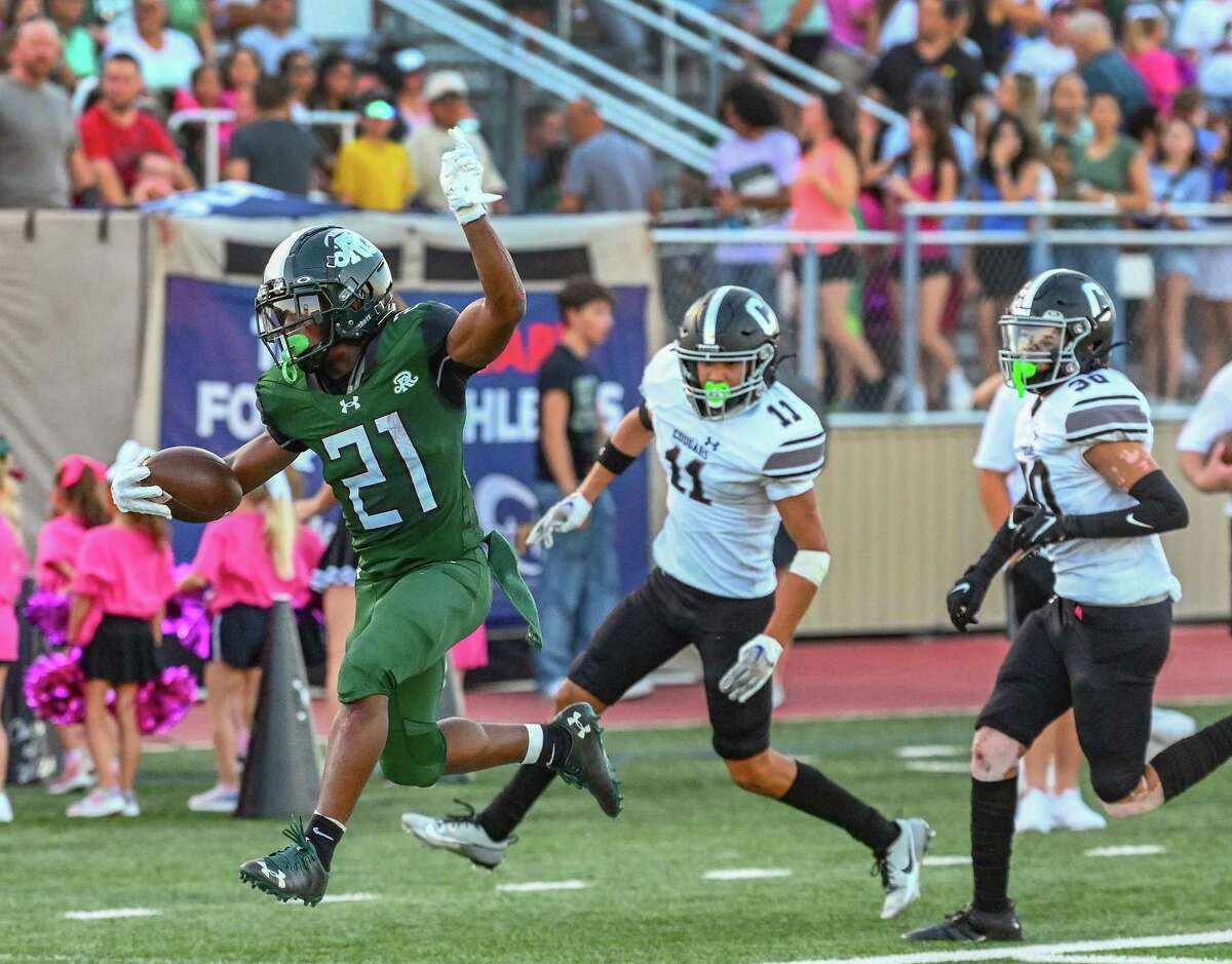 American football sportsman player on stadium running in action