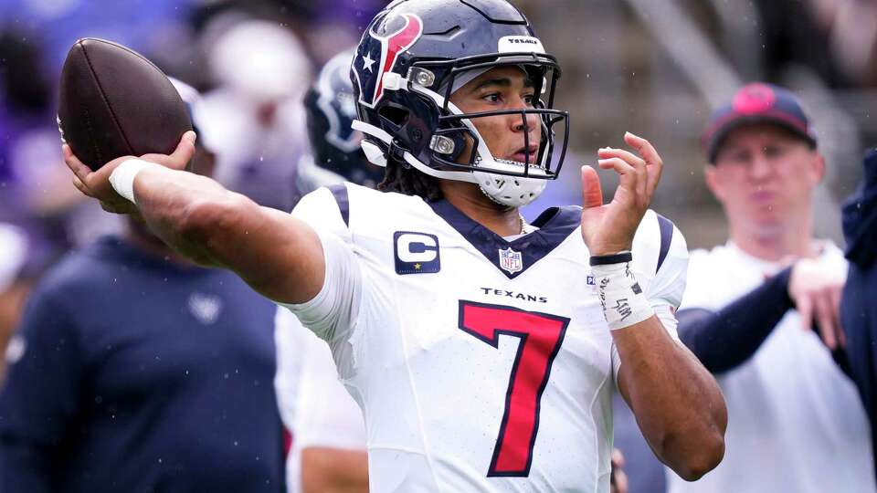Houston Texans quarterback C.J. Stroud (7) throws a pass while warming up before an NFL football game against the Baltimore Ravens Sunday, Sept. 10, 2023, in Baltimore.