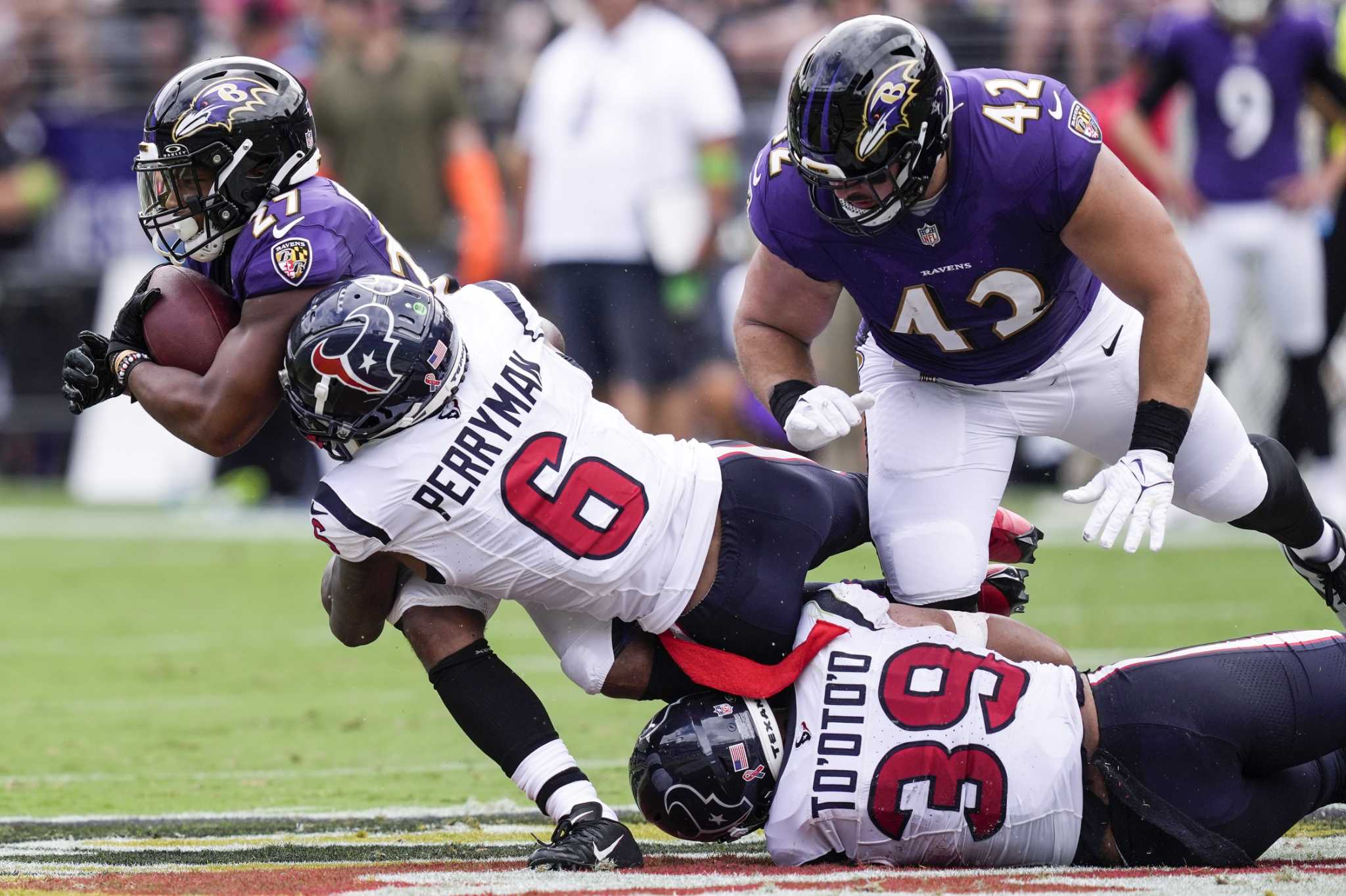 Baltimore Ravens tackle Morgan Moses (78) walks off the field at