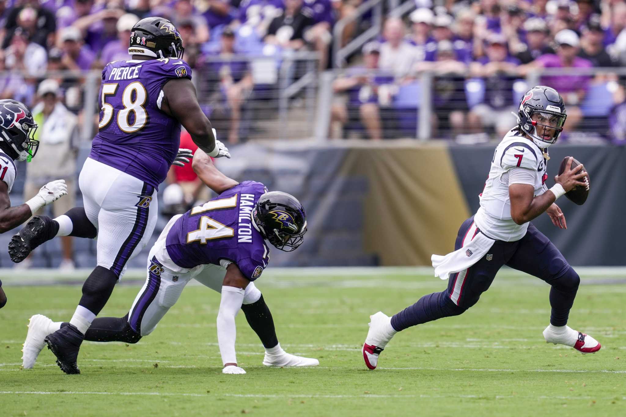 Ravens make no mistakes, hold off Texans