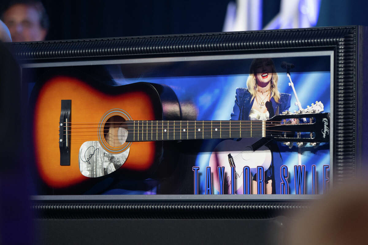 Taylor Swift-Signed Guitar Sells for $120,000 at Cancer Auction