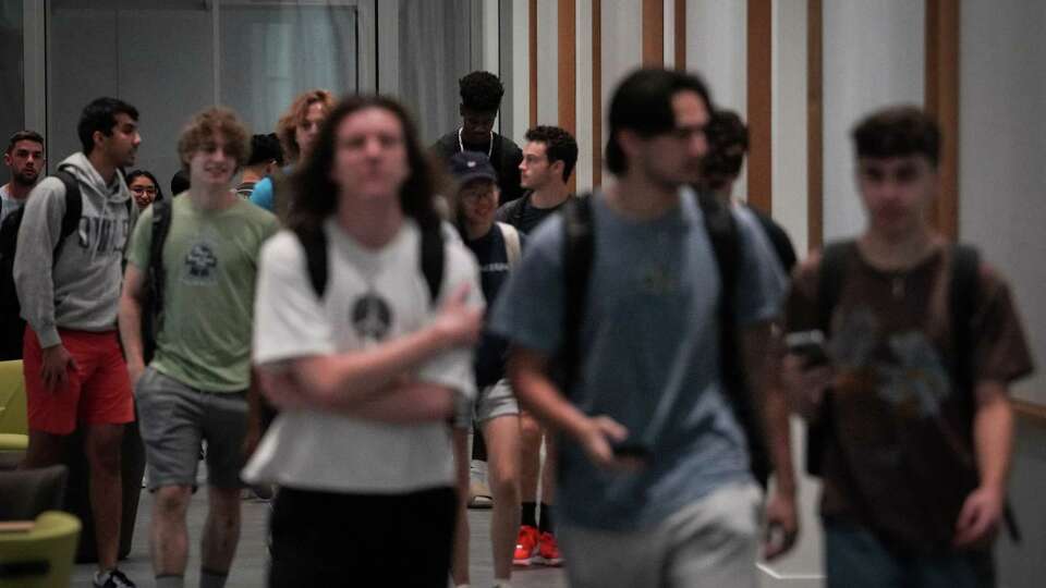 Students leave a class Monday, Sept. 11, 2023, in the Ralph S. O'Connor Building for Engineering and Science at Rice University in Houston.