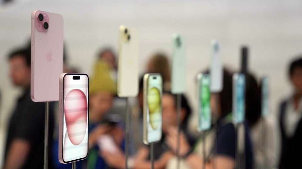 iPhone 15 and 15 Plus models are displayed during an announcement of new products on the Apple campus Tuesday, Sept. 12, 2023, in Cupertino, Calif.