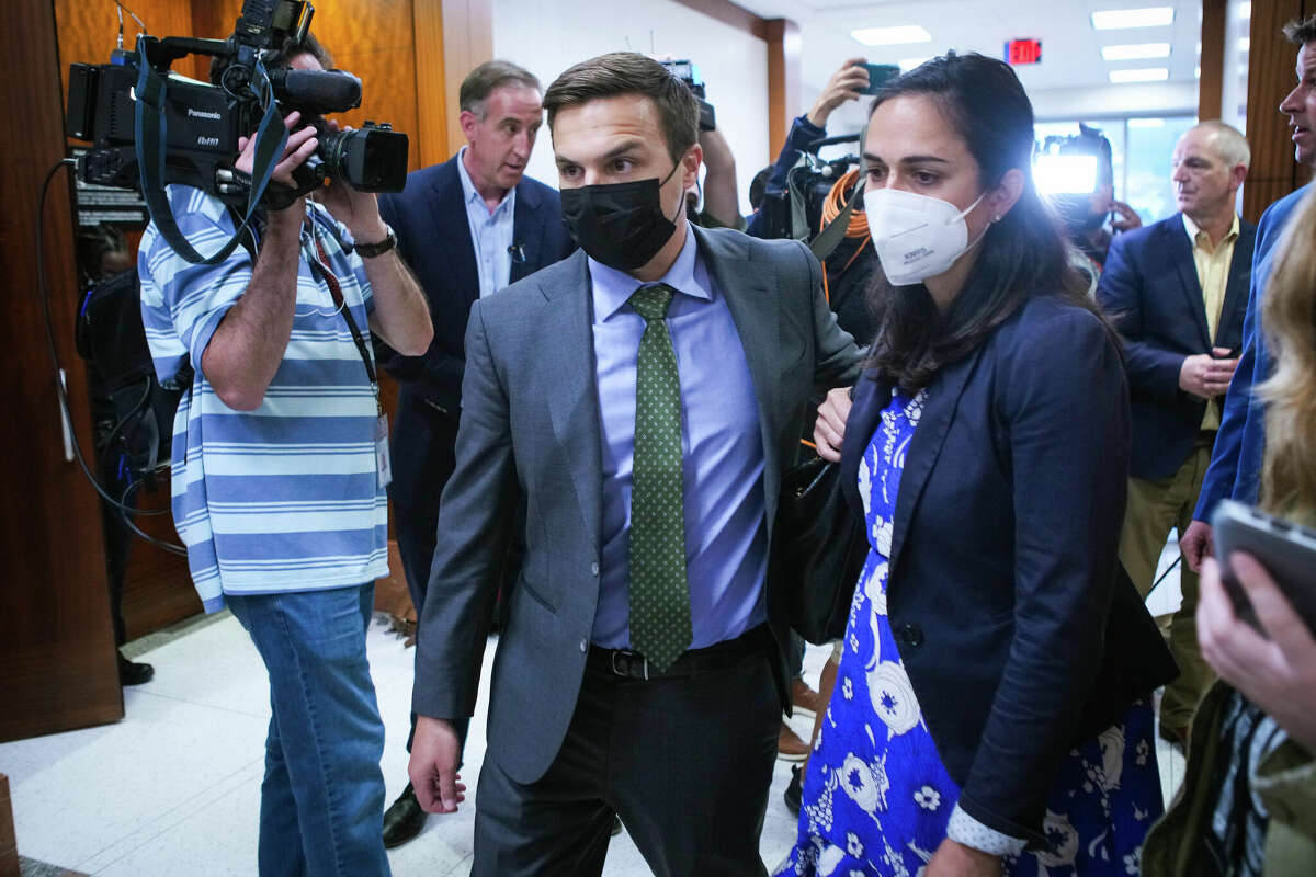 Alexander Triantaphyllis leaves the courtroom after appearing in court after COVID contract indictments were handed down Tuesday, April 12, 2022 in Houston. Two aides to Harris County Judge Lina Hidalgo and former aide, all indicted on criminal charges amid an investigation in a since-canceled vaccine outreach contract, appeared in court Tuesday. Triantaphyllis and Wallis Nader, who work for Hidalgo, were indicted on Monday on two felony charges of misuse of official information and tampering. Aaron Dunn, who recently left her office, was indicted on the same charges.