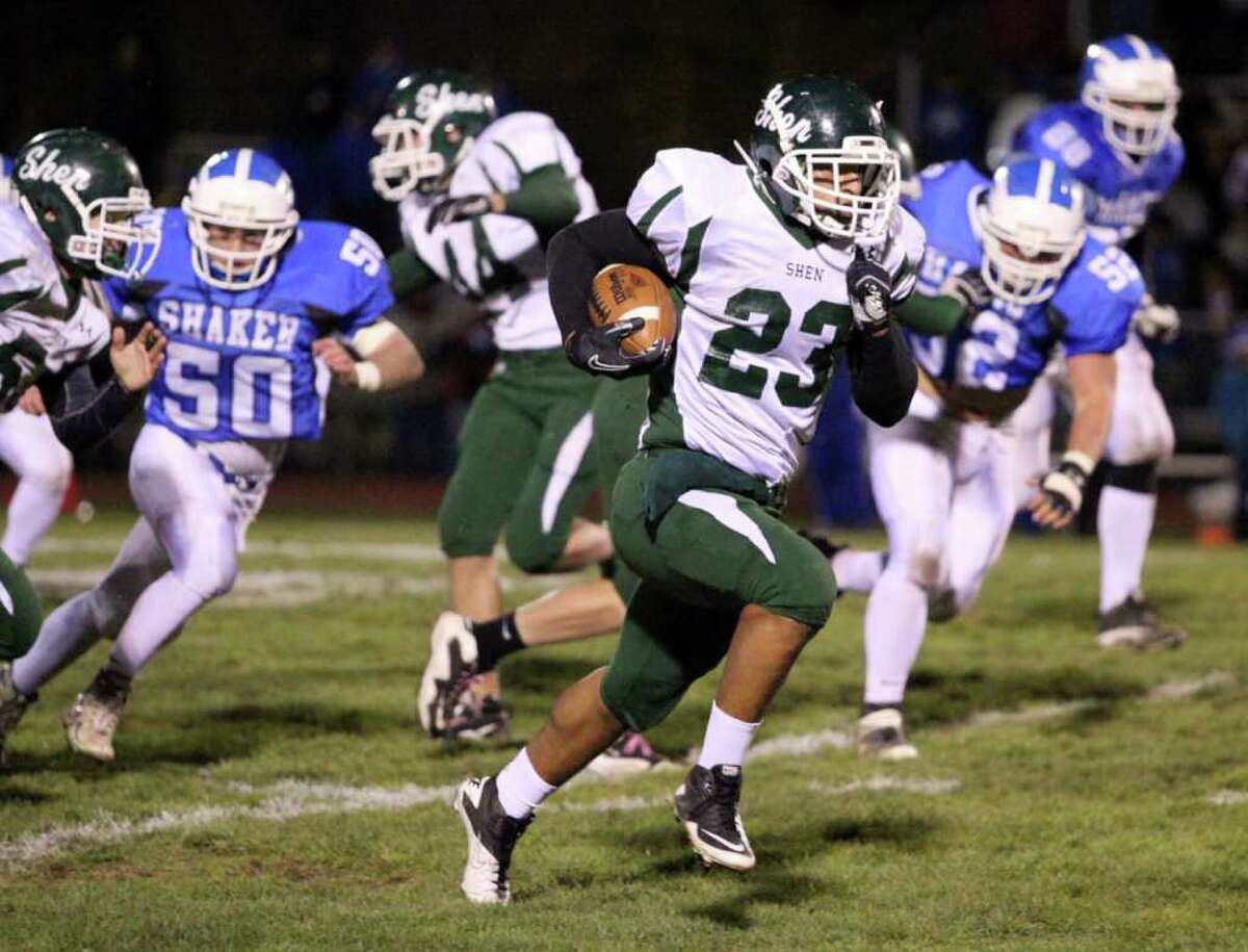High school football -- Shenendehowa's Bronson Greene (23) runs up the field to score a touchdown against Shaker. (Patrick Dodson / Special to the Times Union)
