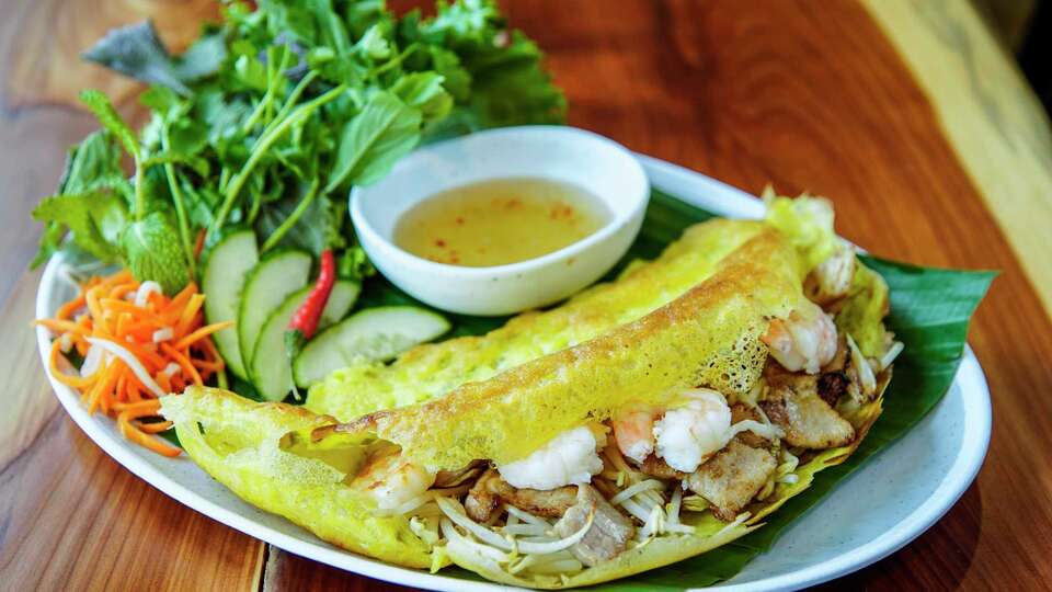 The Banh Xeo Saigon a Vietnamese crepe made with pork belly and shrimp at Xeo Yum at Conservator Food Hall on Wednesday, Sept. 13, 2023 in Houston.