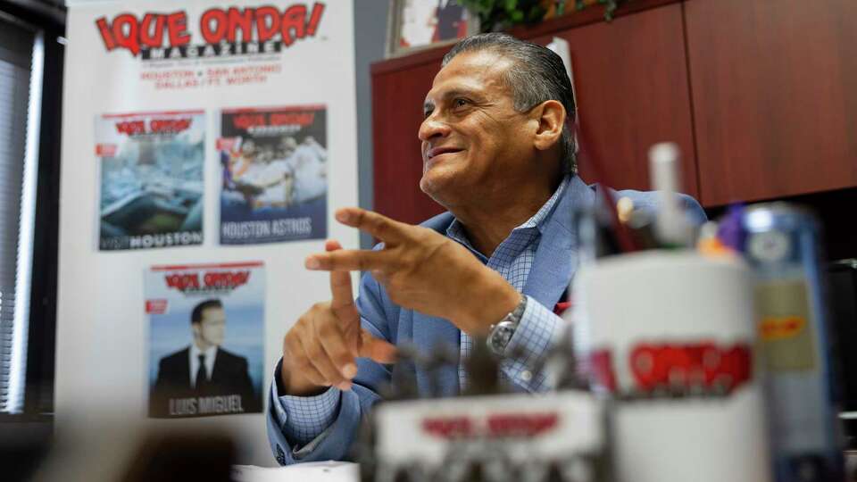 Gabriel Esparza, publisher of the bilingual publication ¡Que Onda! magazine, talks about the most important things he reports in his office on Wednesday, Sept. 13, 2023, in Houston. Esparza's parents started the magazine 30 years ago to keep Spanish-speaking residents of Houston informed.