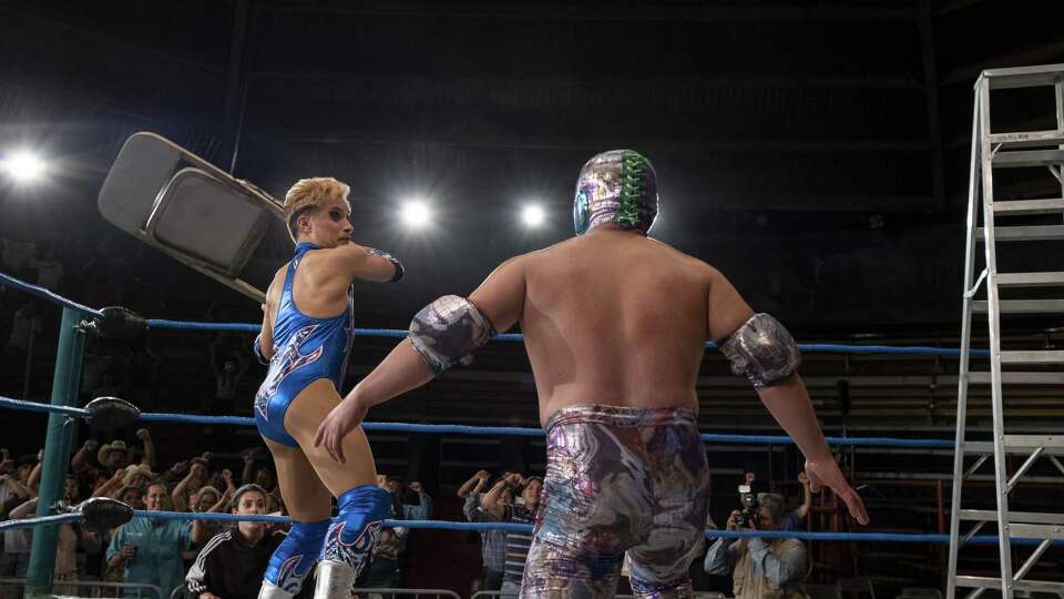 Gael García Bernal, left, and El Hijo del Santo in 