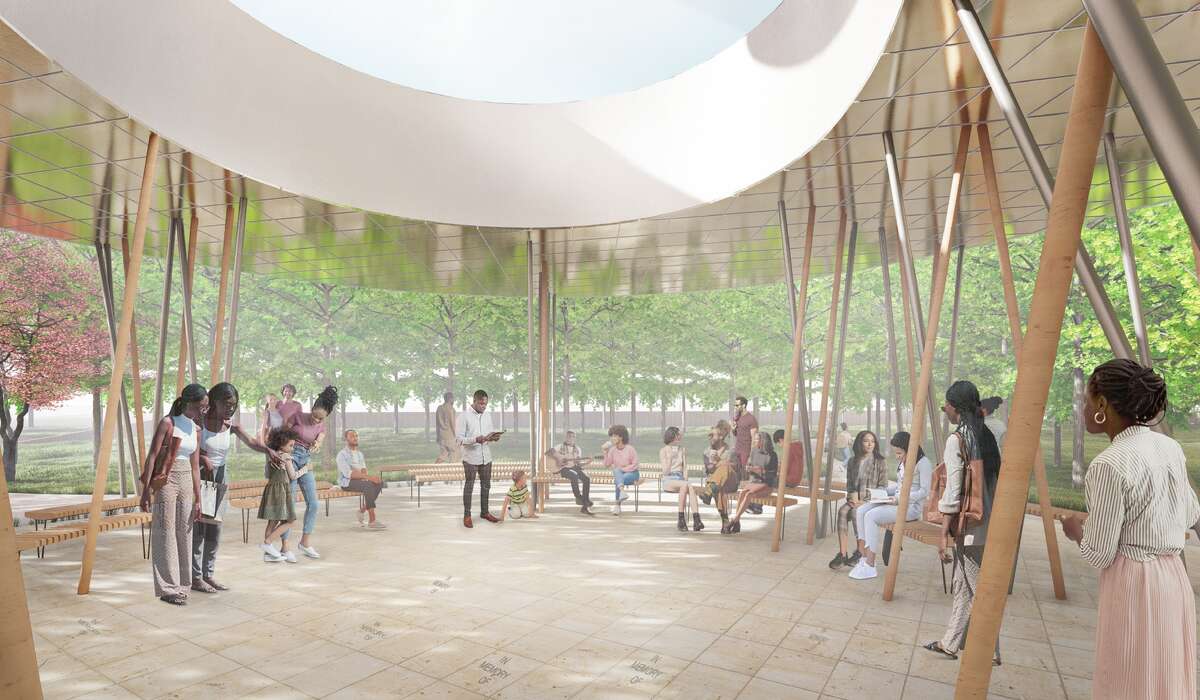 The pavilion, a spacious covered structure under construction, is designed to accommodate large groups for outdoor gatherings.