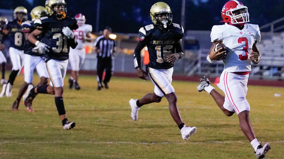 Columbus running back Ty'Vone Whitehead (3) runs into the end zone for a touchdown during the first half of a high school football game against North Forest, Friday, Sept. 14, 2023, in Houston.