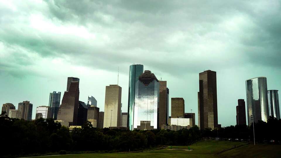 Storm clouds over the downtown skyline on Friday, Sept. 15, 2023 in Houston.