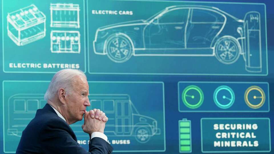 FILE - President Joe Biden listens during an event in the South Court Auditorium in the Eisenhower Executive Office Building on the White House complex, Tuesday, Feb. 22, 2022, in Washington. Two of President Joe Biden's top goals, fighting climate change and expanding the middle class by supporting unions, are colliding in the key battleground state of Michigan as the United Auto Workers go on strike against the country's biggest car companies.