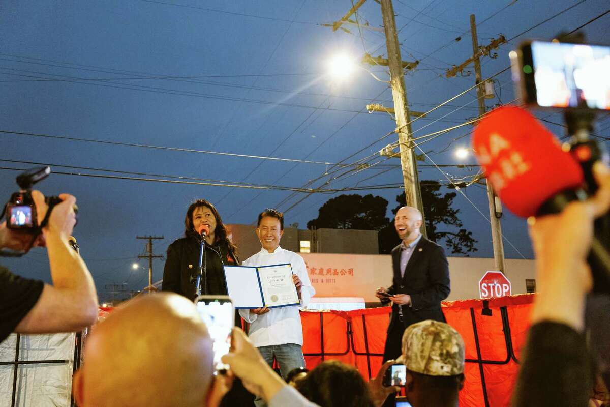 Chef Martin Yan receives an award from Mayor London Breed in the Sunset District on Friday. San Francisco Supervisor Joel Engardio is launching the Sunset District’s first night market to foster community and stimulate the local economy.