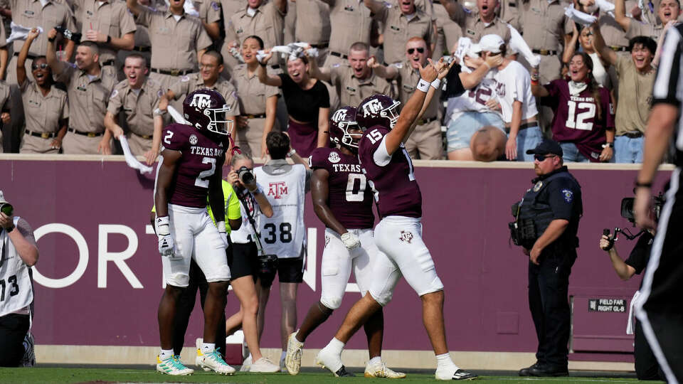 Texas A&M quarterback Conner Weigman (15) reacts after scoring a touchdown against Louisiana-Monroe during the first half of an NCAA college football game Saturday, Sept. 16, 2023, in College Station, Texas. (AP Photo/Sam Craft)