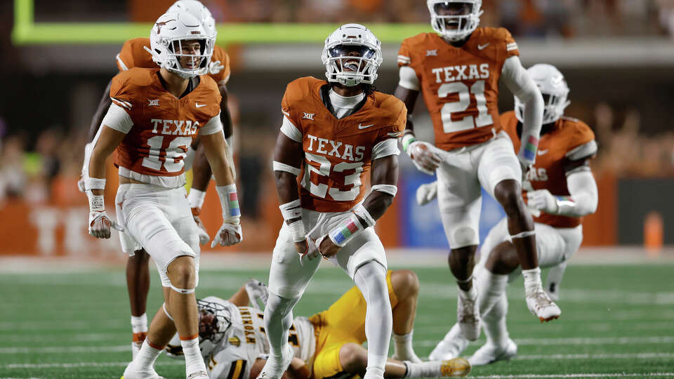 AUSTIN, TEXAS - SEPTEMBER 16: Jahdae Barron #23 of the Texas Longhorns celebrates after tackling Wyatt Wieland #11 of the Wyoming Cowboys in the second half at Darrell K Royal-Texas Memorial Stadium on September 16, 2023 in Austin, Texas. (Photo by Tim Warner/Getty Images)