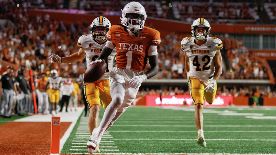 AUSTIN, TEXAS - SEPTEMBER 16: Xavier Worthy #1 of the Texas Longhorns scores a touchdown in the fourth quarter against the Wyoming Cowboys at Darrell K Royal-Texas Memorial Stadium on September 16, 2023 in Austin, Texas. (Photo by Tim Warner/Getty Images)