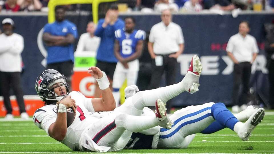 Houston Texans quarterback C.J. Stroud (7) is sacked after the touchdown on the previous play was called back due to a penalty during the second half of an NFL football game Sunday, Sept. 17, 2023, in Houston.