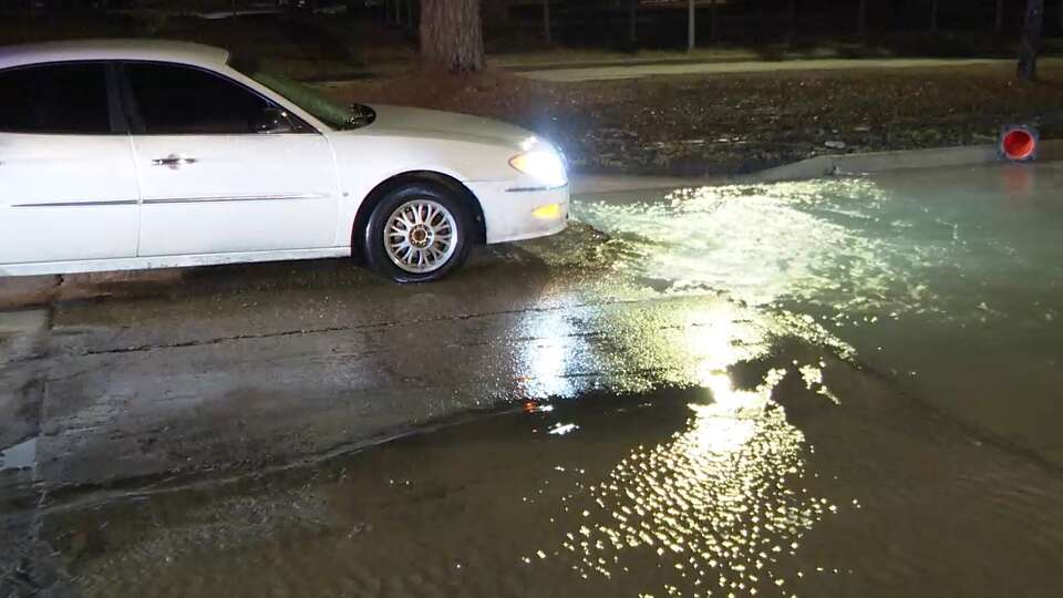 Pico Mallard was driving home around 3:45 a.m. Monday morning when his car suddenly fell into a deep crevice on Victory Drive in Acres Homes. The image is a screenshot of the Mallard's vehicle after it was pulled out of the hole in the street.