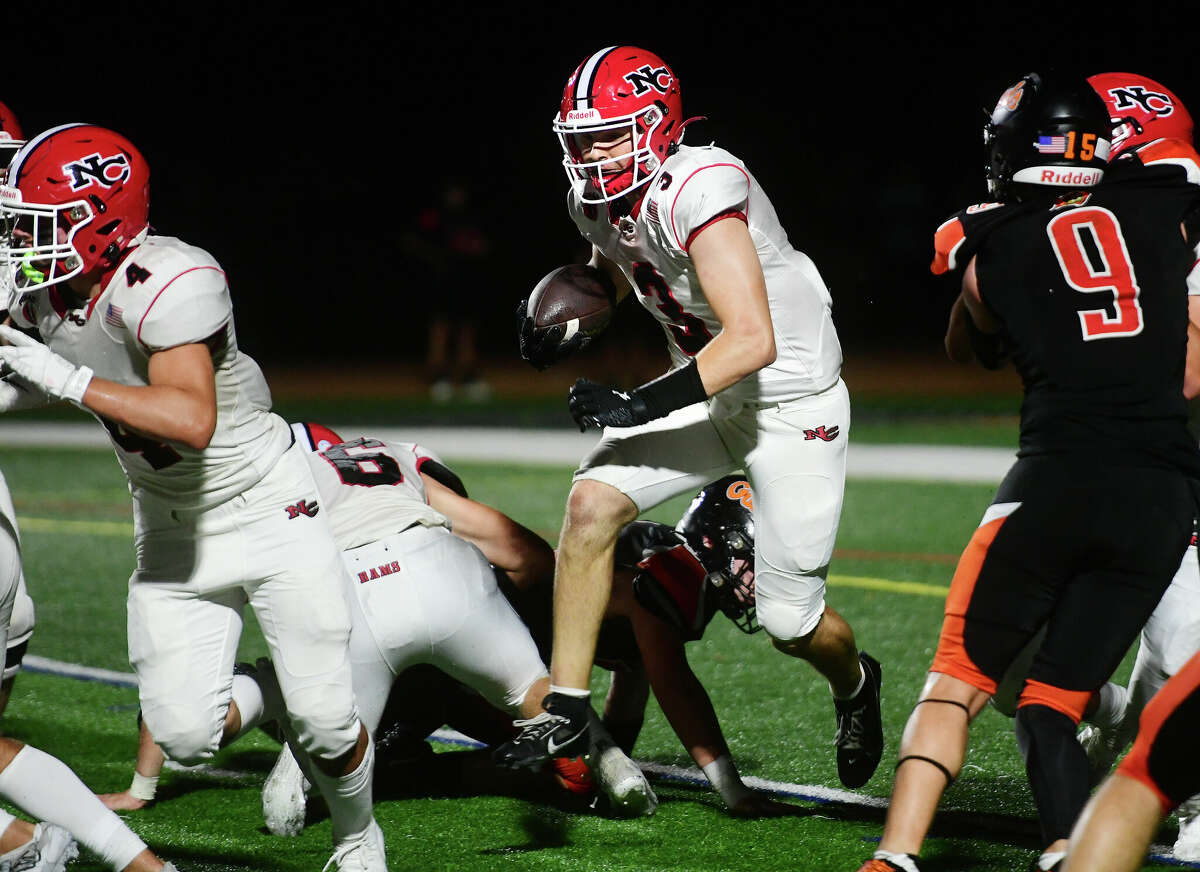 New Canaan football rebounds, shuts out Warde in home opener