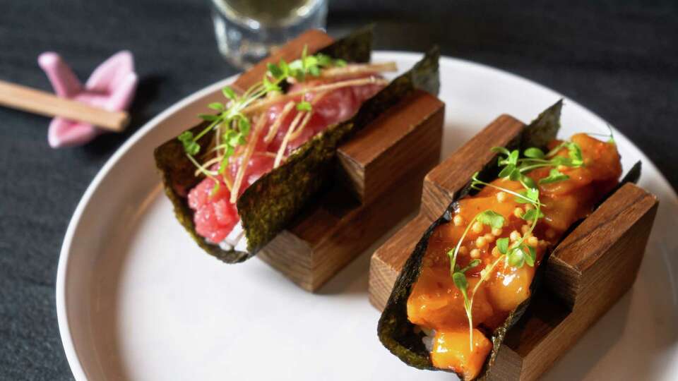 Tuna hand roll, left, and spicy salmon hand roll at Norigami.