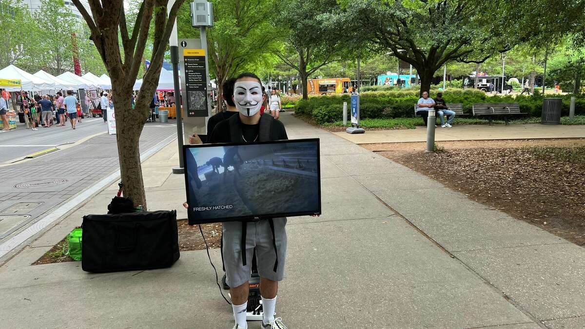 Animal rights group, Anonymous for the Voiceless, is suing the city of Houston and Discovery Green after one of its members was arrested during a protest.