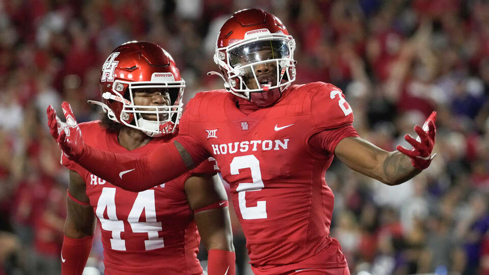 Houston Cougars wide receiver Matthew Golden (2) reacts after returning a kickoff for a 98-yard touchdown during the second quarter of the University of Houston's inaugural Big 12 NCAA college football game at TDECU Stadium, Saturday, Sept. 16, 2023, in Houston.