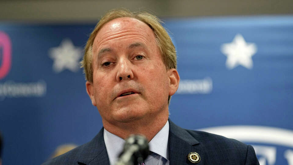 Attorney General Ken Paxton reads a statement at his office in Austin on May 26, 2023, ahead of his impeachment by the Texas House.