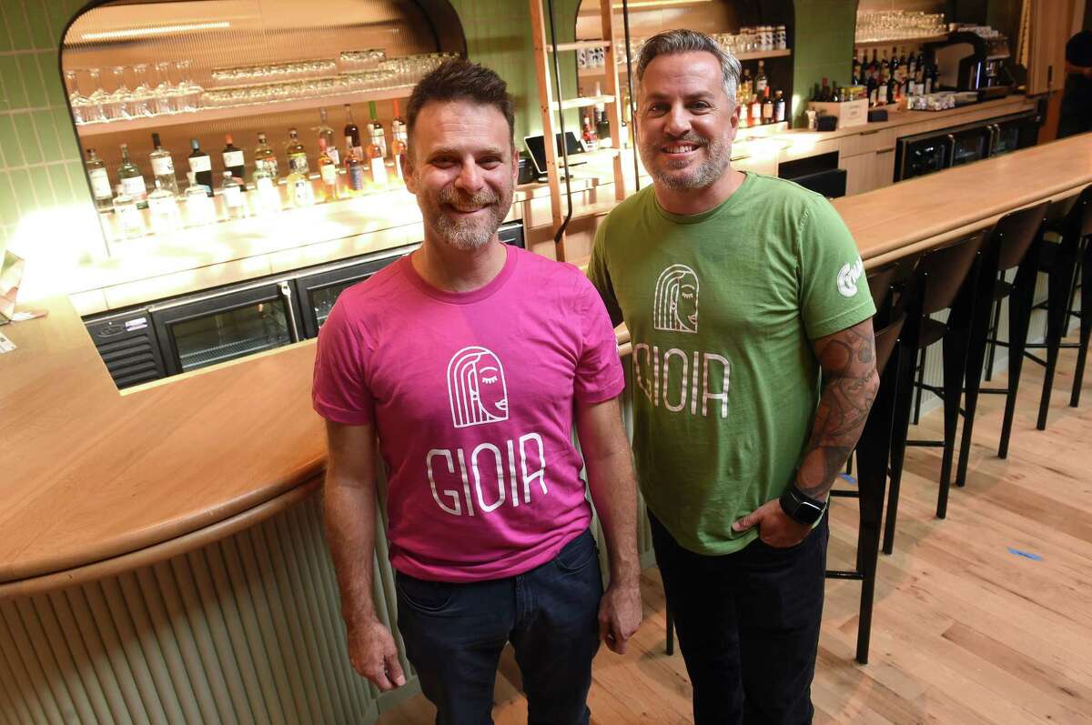 Co-owners Avi Szapiro, left, and Tim Cabral photographed in front of the bar at Gioia in New Haven on September 21, 2023.