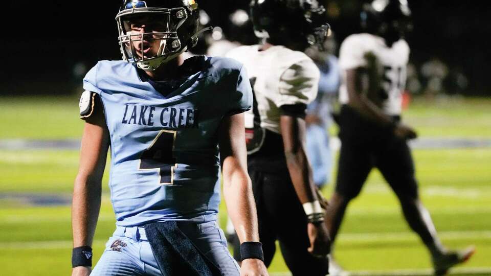 Lake Creek quarterback Eli Morcos (4) reacts after running back Tyvonn Byars' 37-yard touchdown during the second quarter of a District 10-5A Division II high school football game at Montgomery ISD Stadium, Friday, Sept. 22, 2023, in Montgomery.