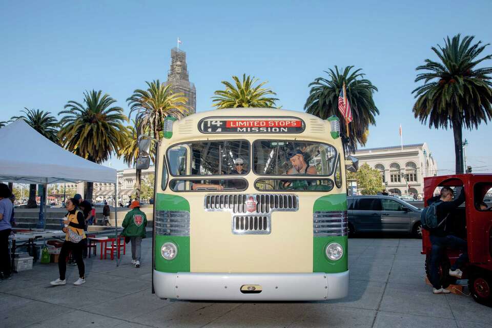 SF locals, visitors climb aboard historic Muni cars at heritage event