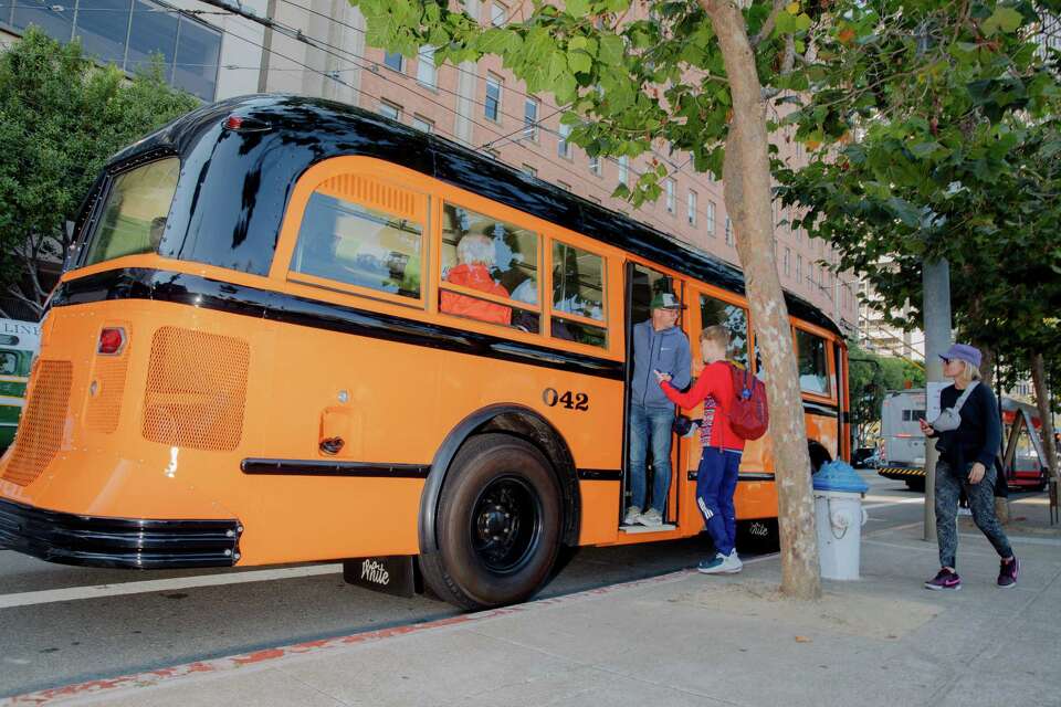 SF locals, visitors climb aboard historic Muni cars at heritage event