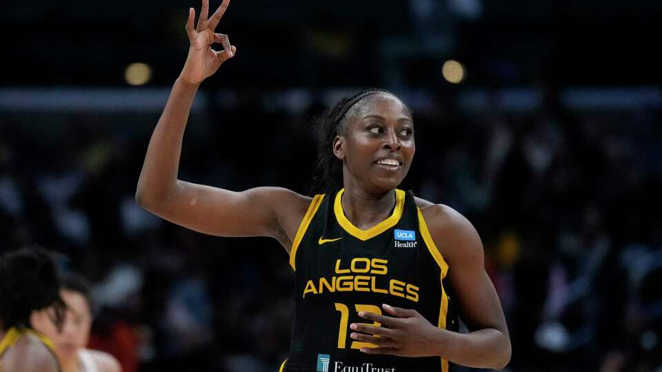 FILE - Los Angeles Sparks forward Chiney Ogwumike (13) celebrates after a three-pointer during the second half of a WNBA basketball game against the Phoenix Mercury in Los Angeles, Friday, May 19, 2023. Ogwumike has always been passionate about her Nigerian heritage. Now she's getting a chance to help all of Africa as a member of the inaugural President's Advisory Council on African Diaspora Engagement in the United States, the White House announced Tuesday, Sept. 26, 2023.