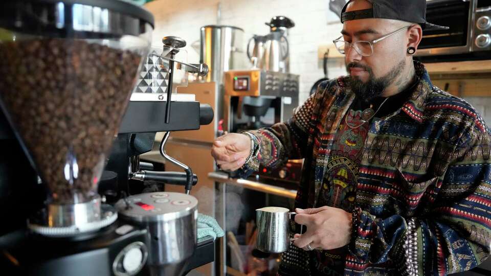 Miguel Angel Becerril Hernandez of Ome Calli Coffee, 2260 Buckthorne Place #179, in the Grogan's Mill Village Center is shown Tuesday, Sept. 26, 2023, in The Woodlands.