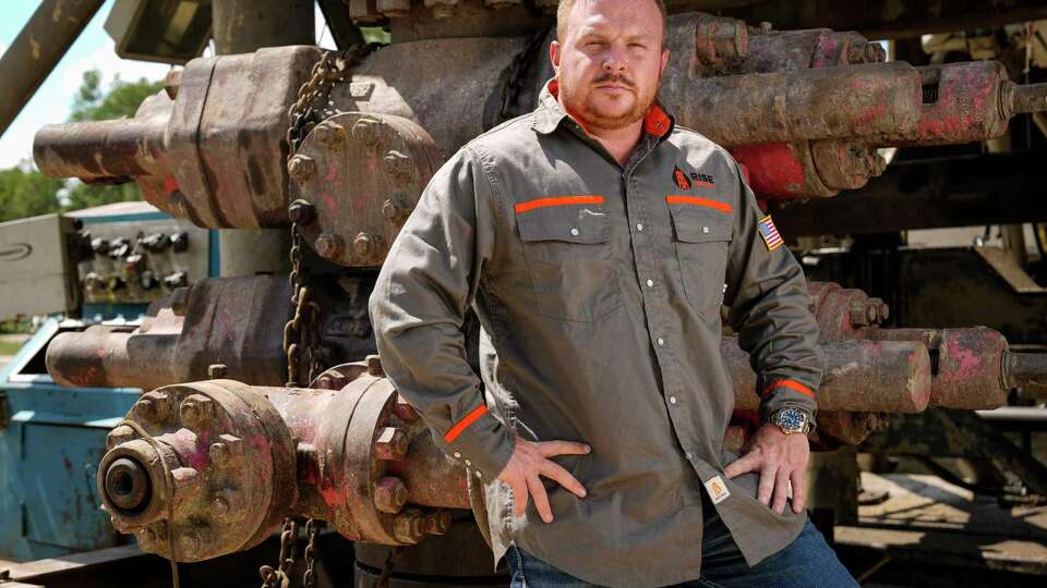 Brent Franklin, president of Rise Capital, poses for a portrait at his drilling site in the Conroe Oil Fields on Tuesday, Sept. 26, 2023 in Conroe. After more than 30 years, drilling is happening in the Conroe Oil Fields. Franklin is heading up the operation. Franklin is a Cut and Shoot native and high school drop out, who got into the oil business after investing several years ago and getting burned. He decided to launch his own company and taught himself drilling by watching YouTube videos and buying the equipment.