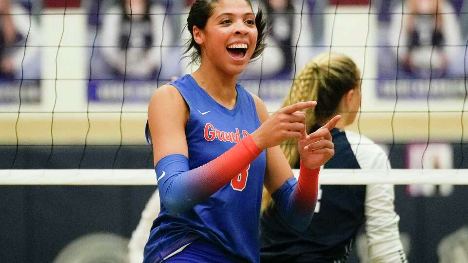 Grand Oaks outside hitter Halle Thompson (8) reacts after scoring a point during the second set of a District 13-6A high school volleyball match at College Park High School, Tuesday, Sept. 26, 2023, in The Woodlands.