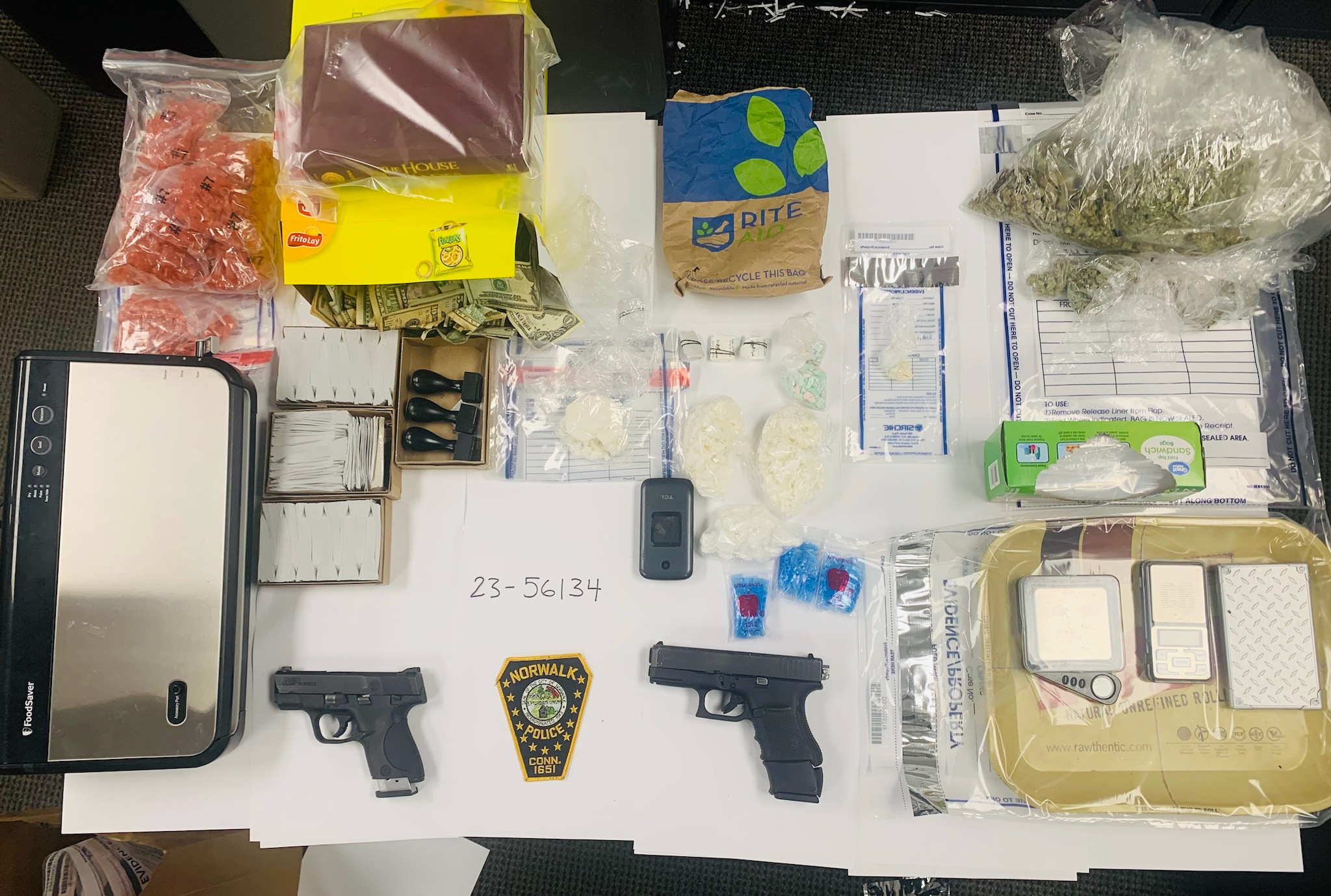 Men found packaging narcotics during search of Norwalk home, cops say