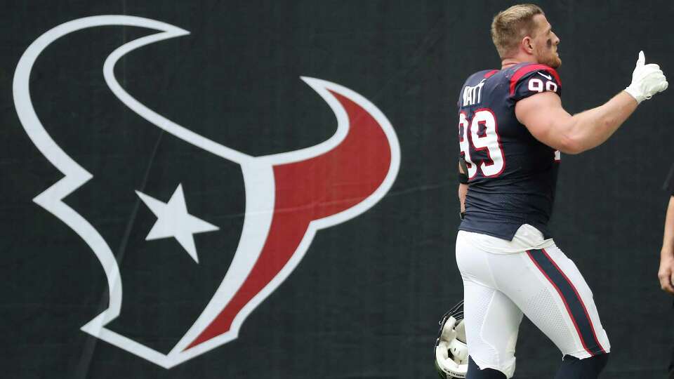 Houston Texans defensive end J.J. Watt (99) gives a thumbs up to fans as he walks off the field following the Texans 27-20 win over the New England Patriots in an NFL football game at NRG Stadium on Sunday, Nov. 22, 2020, in Houston.