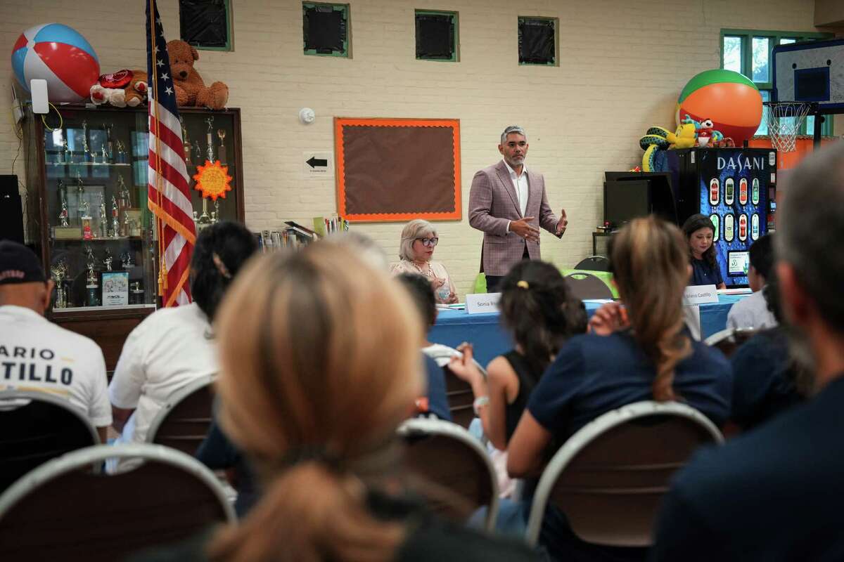 City Council candidate Mario Castillo speaks with residents during a District H candidate forum on Tuesday, Sept. 26, 2023, at the Proctor Plaza Park Community Center in Houston.