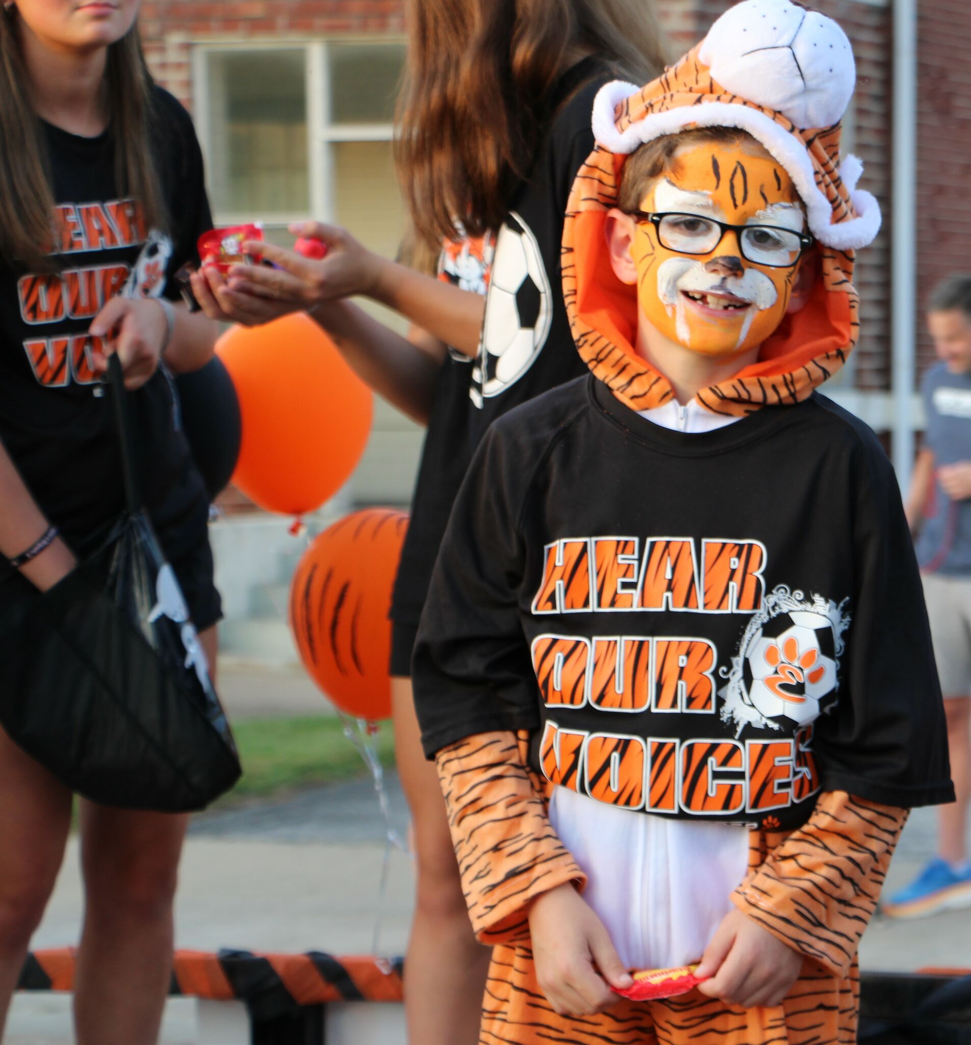 Edwardsville High School's groovy parade draws hundreds