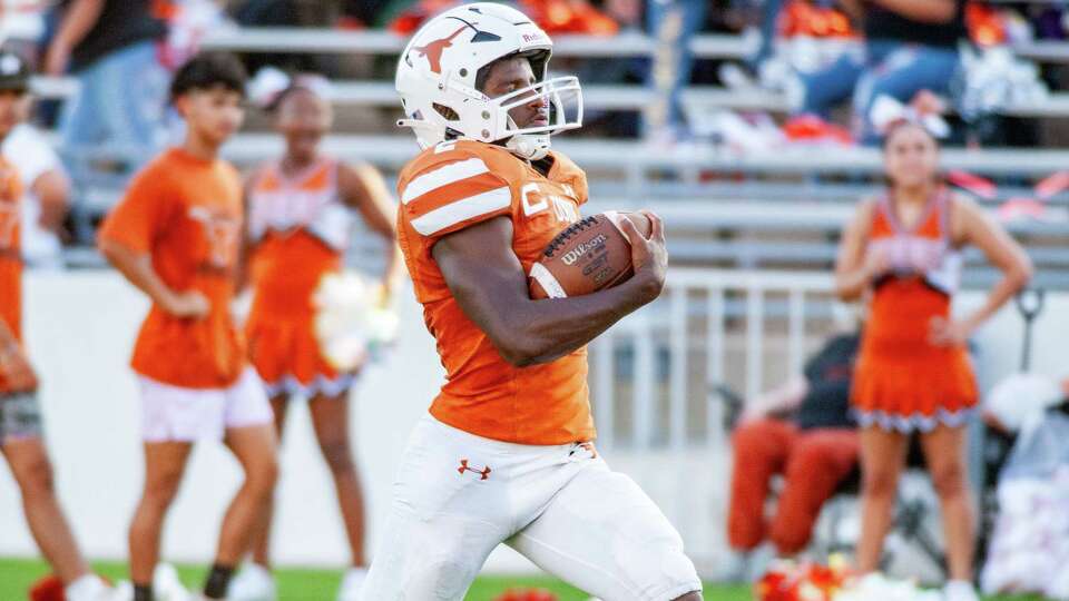 Dobie's Cameron Mathews (2) sprints down the sideline for a touchdown against Pasadena in the first half of a high school football game at Veterans Memorial Stadium, Thursday, Sep. 28, 2023 in Pasadena.