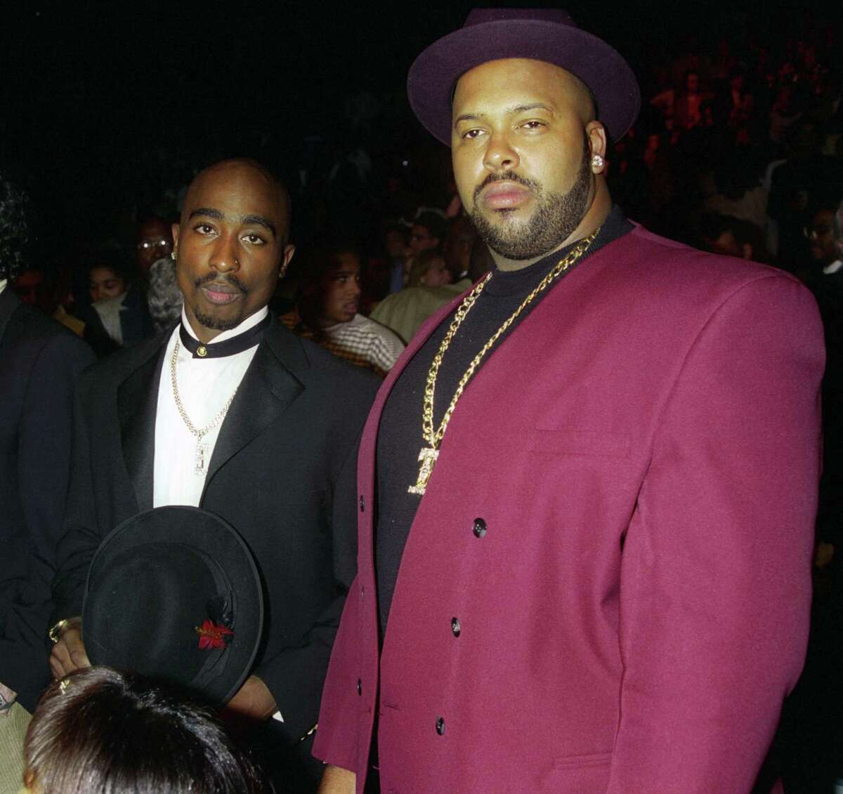 Tupac Shakur, left, and Marion “Suge” Knight at the Mike Tyson versus Frank Bruno fight at the MGM Grand Garden Arena on March 16, 1996. Shakur and Knight were in a car together on Sept. 7, 1996, when a white Cadillac pulled up beside them, and gunfire erupted, which resulted in Shakur’s death.