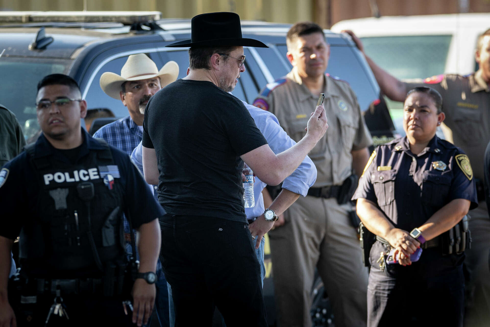 Elon Musk dons backward cowboy hat at US-Mexico border visit