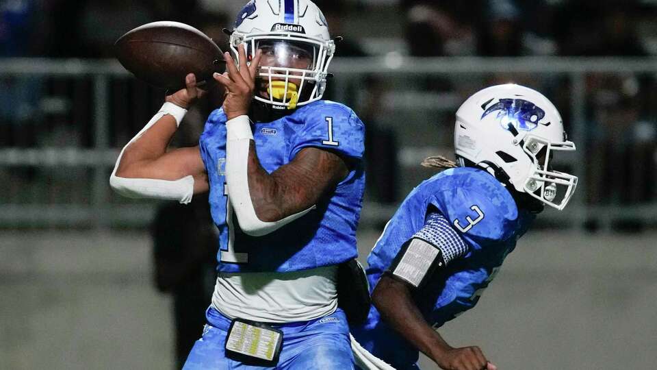 C.E. King quarterback Darius Clark-James (1) makes a pass during the first quarter of a District 21-6A high school football game at Panther Stadium, Friday, Sept. 29, 2023, in Houston.