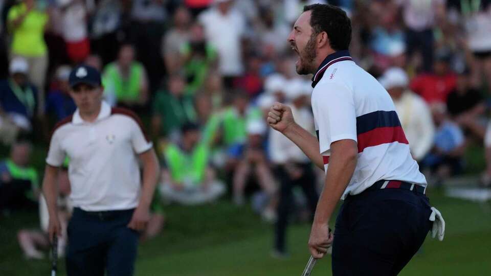 United States' Patrick Cantlay celebrates after holing his putt that led to him winning his afternoon Fourballs match on the 18th green at the Ryder Cup golf tournament at the Marco Simone Golf Club in Guidonia Montecelio, Italy, Saturday, Sept. 30, 2023.