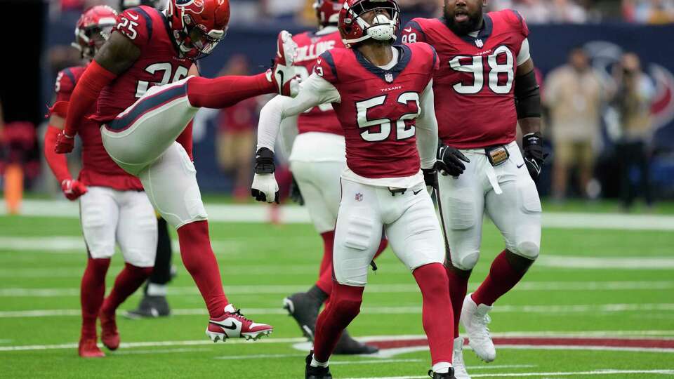 Houston Texans defensive end Jonathan Greenard (52) celebrates after sacking Pittsburgh Steelers quarterback Kenny Pickett during the second half an NFL football game Sunday, Oct. 1, 2023, in Houston.