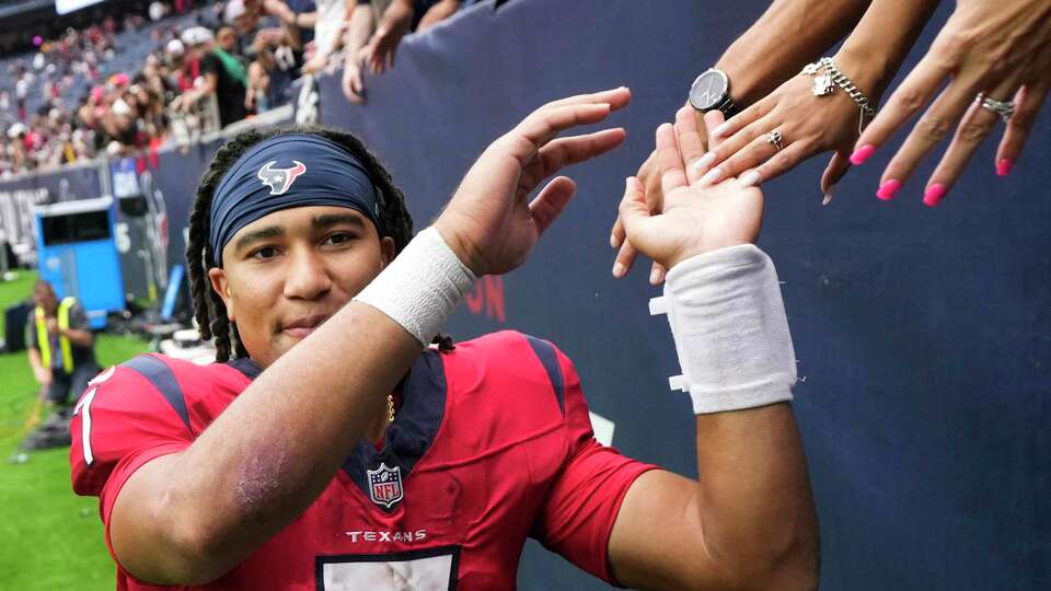 Houston Texans quarterback C.J. Stroud celebrates with fans after the Texans 30-6 win over the Pittsburgh Steelers during the second half an NFL football game Sunday, Oct. 1, 2023, in Houston.