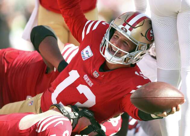 49ers' Brock Purdy flirts with passing perfection to beat Cardinals