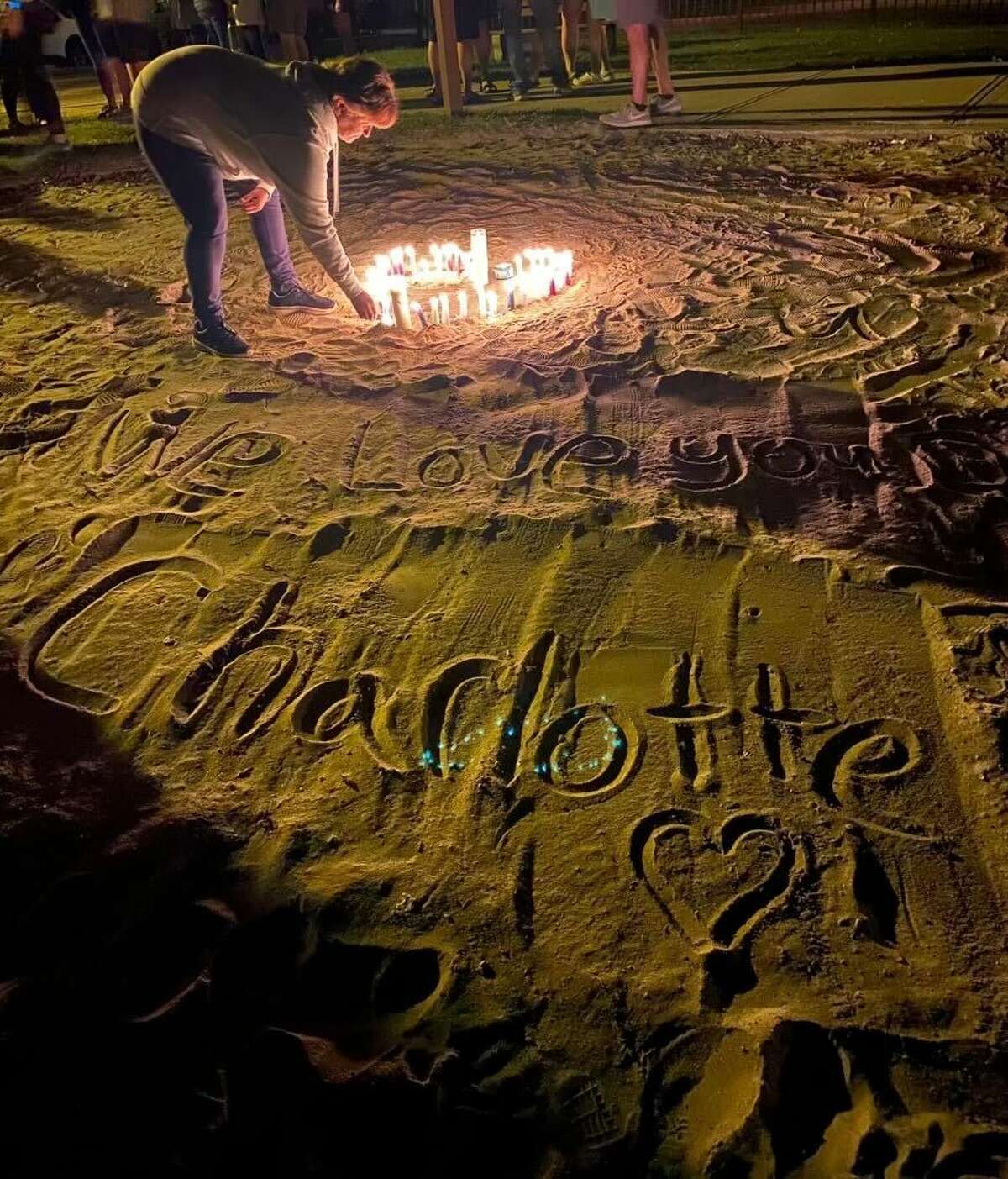 Community members held a vigil on the banks of the Hudson River in Corinth for missing 9-year-old Charlotte Sena on Sunday, Oct. 1, 2023. Charlotte disappeared from Moreau Lake State Park.