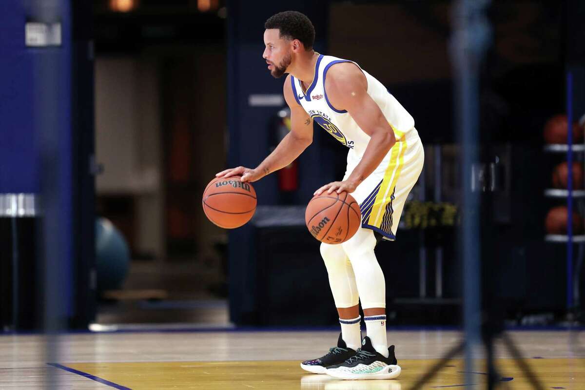 Golden State Warriors’ Stephen Curry poses during media day at Chase Center in San Francisco, Calif., on Monday, October 2, 2023.