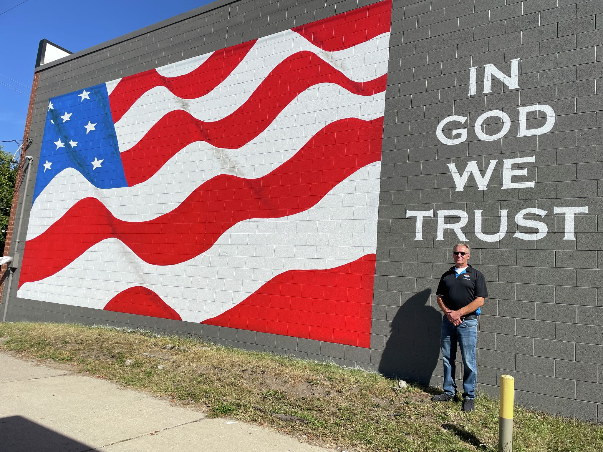 Big Rapids Currie's Amoco gas station adorned with American flag